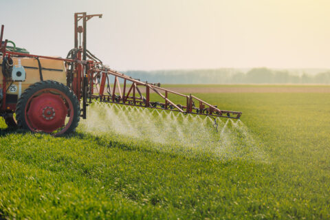 tractor spraying herbicides on field agriculture 2022 12 06 23 29 25 utc